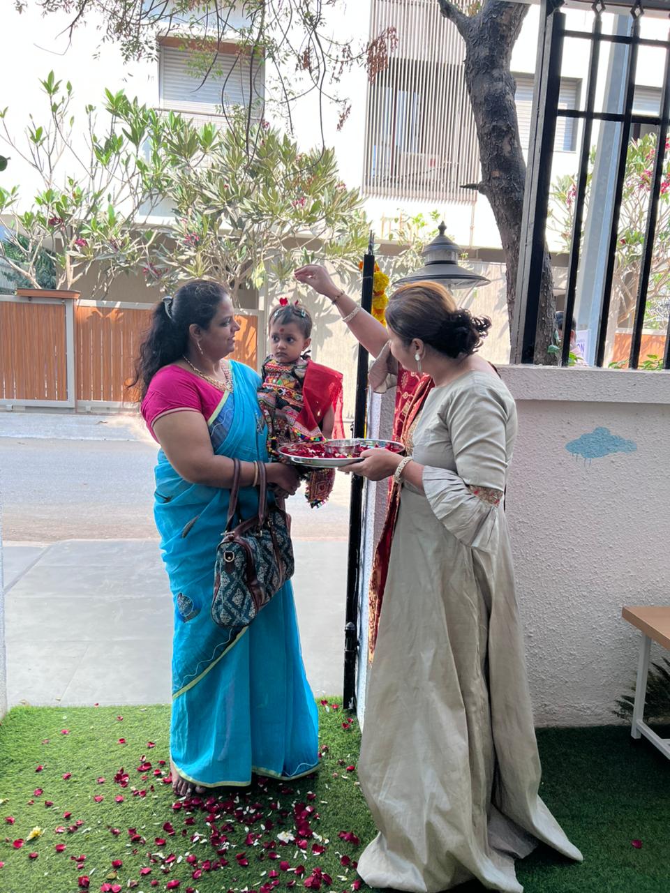 Holi Celebration on 1st Mar'26 at Basilwoods Preschool in Kharghar where a faculty is welcoming our guest
